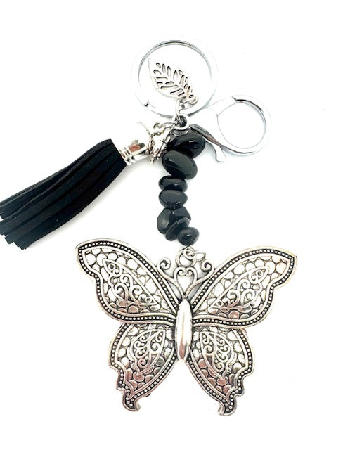 Großhandel Schmetterling-Schlüsselanhänger mit Onyx-Steinen & Schwarz Quaste