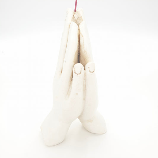 Rucherstbchenhalter weie Hand meditierend