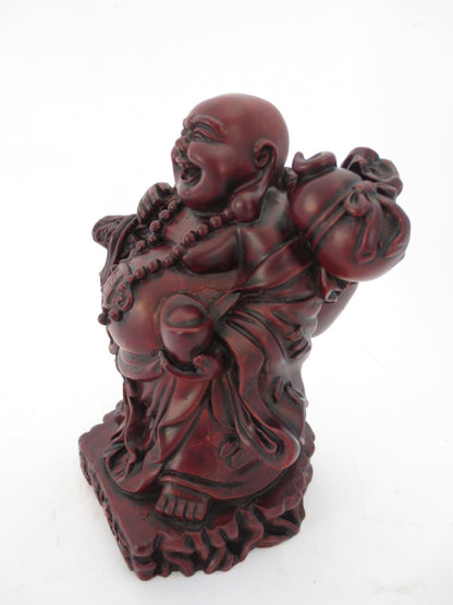 Großhandel – Boedha Red steht mit Gold